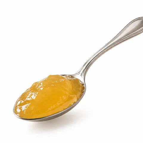 Silver spoon with golden sea moss gel